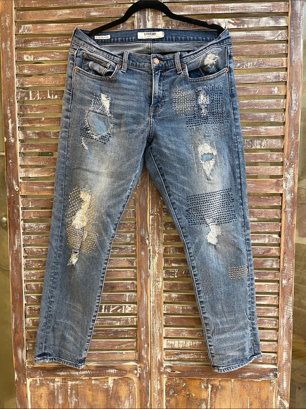 Lucky Brand Distressed Blue Boyfriend Jeans with Patch Details